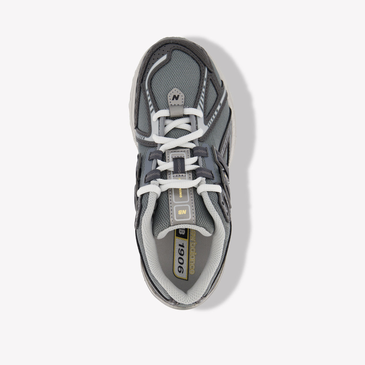 New Balance G1906 Unisex Sneakers in Donker Grijs