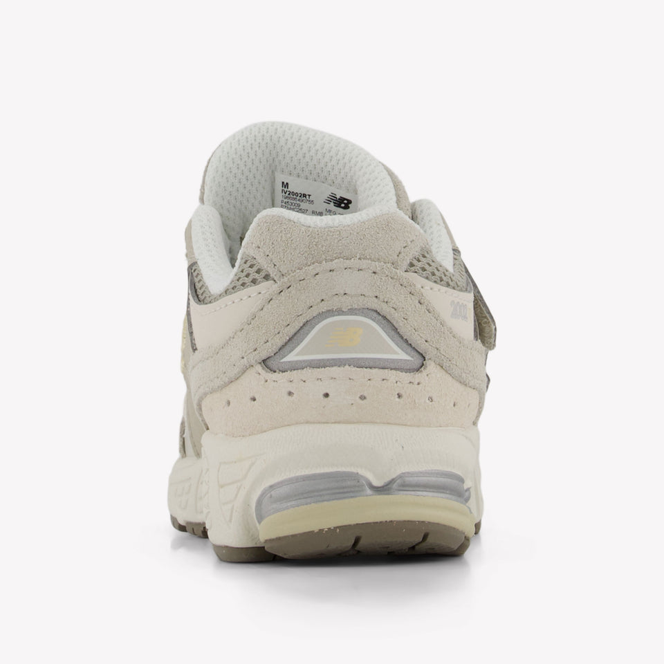 New Balance Kinder Jongens Sneakers in Creme